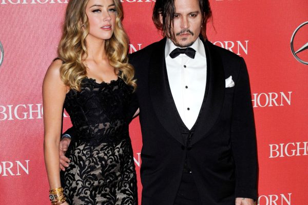 Charlize Theron’s Cold Dior Moment With Johnny Depp Goes Viral